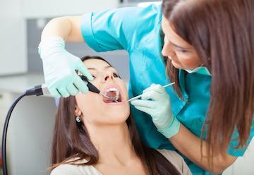 woman getting a dental exam in palatine