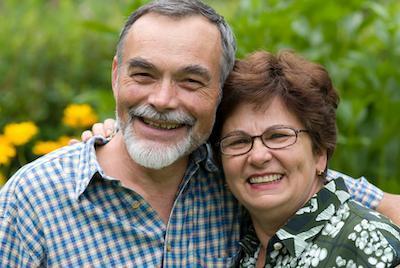 man and woman smiling
