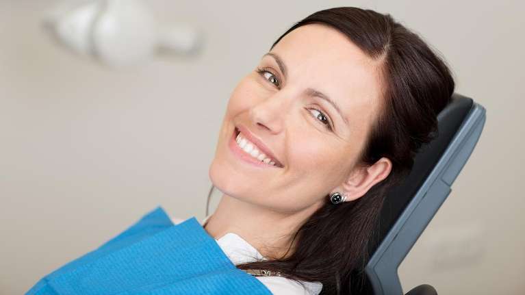 A woman at the dentist in Palatine