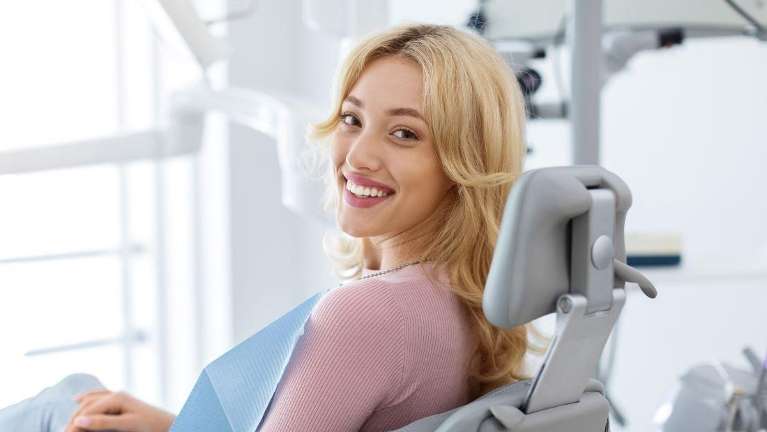 woman smiling in dental chair in palatine