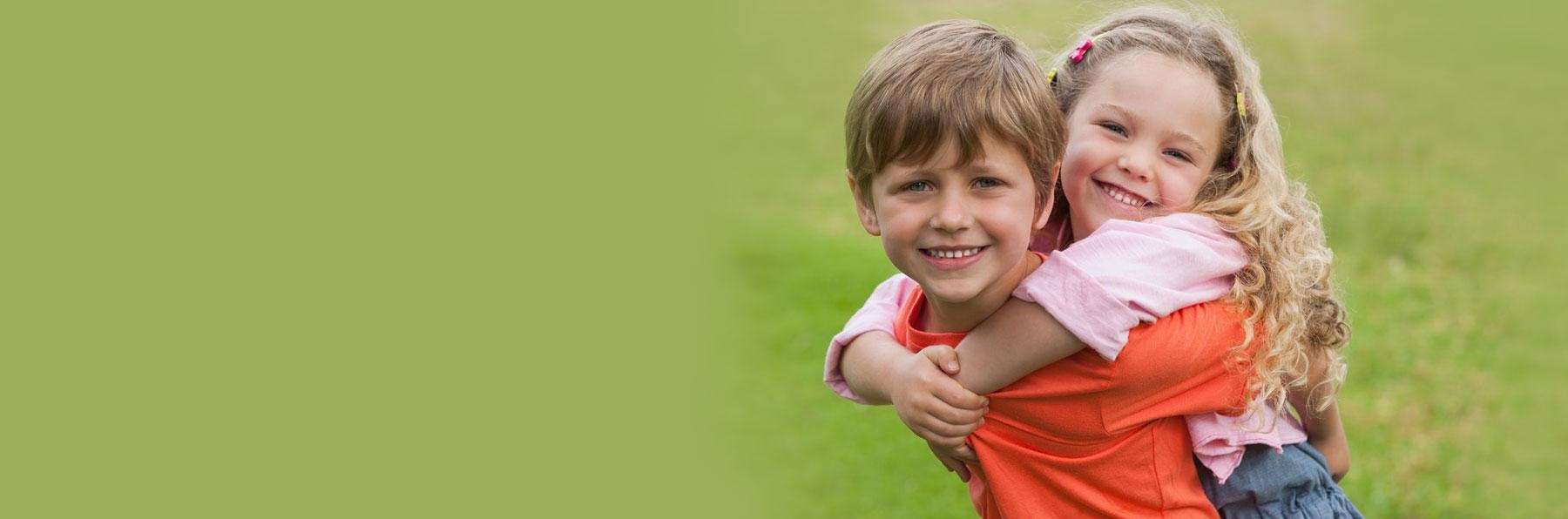 Two children smiling